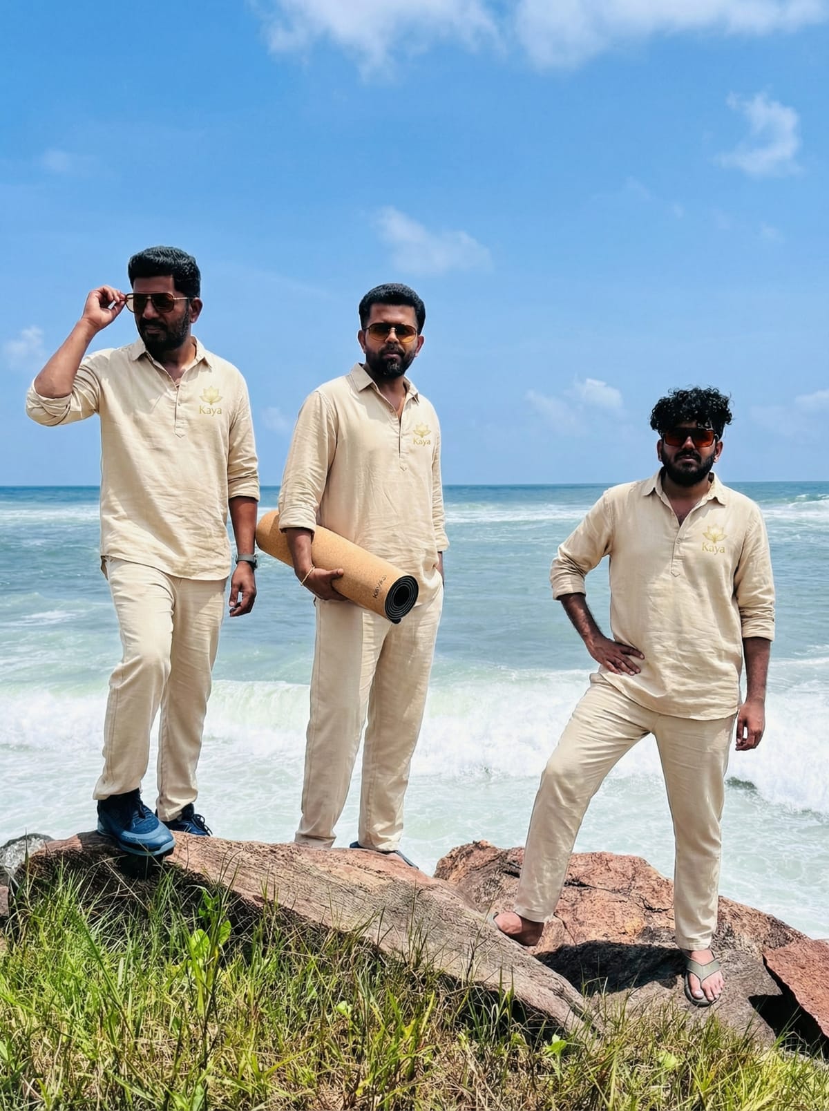 The three Kaya Eco Living founders standing by the ocean